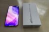 iPhone Air review showing Apple’s lightest iPhone unboxed with its slim design and display next to packaging