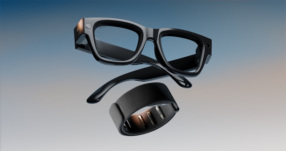 A product shot of the Meta Ray-Ban Display glasses and the Meta Neural Band, which work together as a system, shown against a gradient background