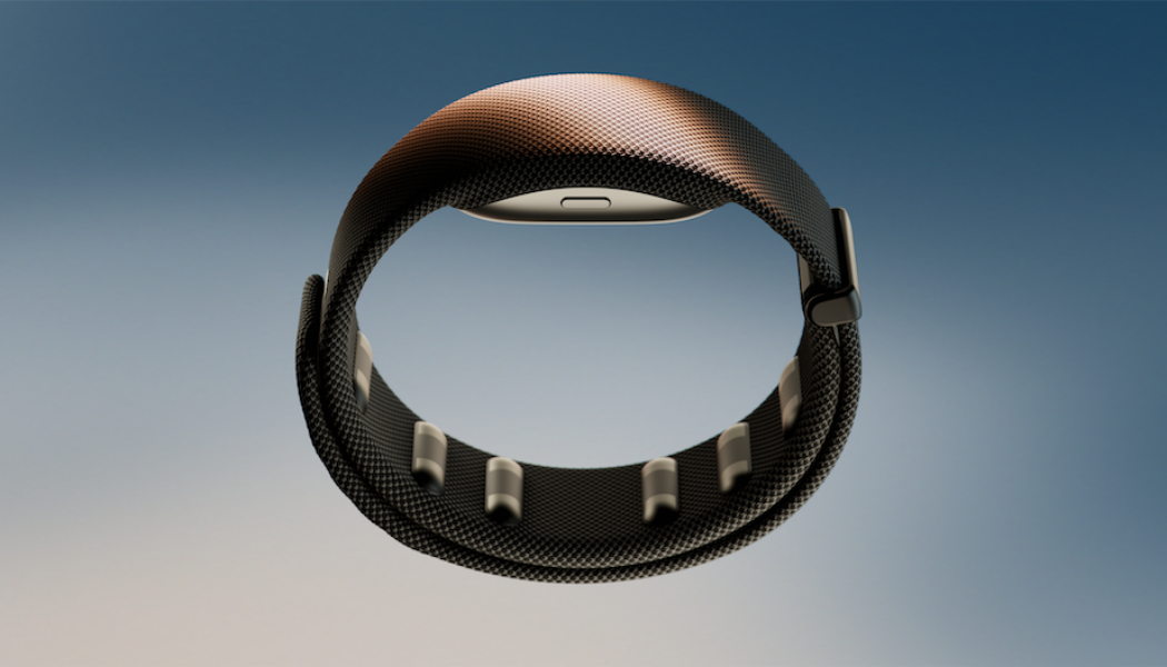 Meta Neural Band wrist device shown as a slim black band with embedded EMG sensors on the inner surface, designed for detecting muscle signals to enable EMG-based interaction.