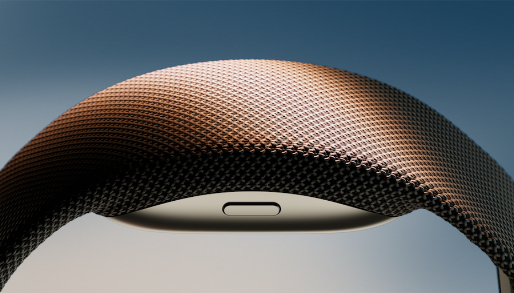 Close-up of the Meta Neural Band EMG wristband used for EMG smart home control research, showing the textured fabric strap and wrist-mounted sensor.