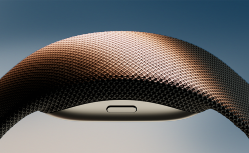 Close-up of the Meta Neural Band EMG wristband used for EMG smart home control research, showing the textured fabric strap and wrist-mounted sensor.