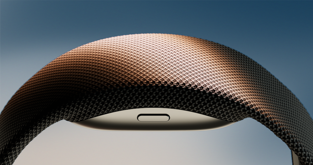 Close-up of the Meta Neural Band EMG wristband used for EMG smart home control research, showing the textured fabric strap and wrist-mounted sensor.