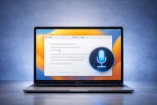 Featured image showing a MacBook with Voice Control on screen after Apple fixed the new line and new paragraph bugs in macOS 26.4.1