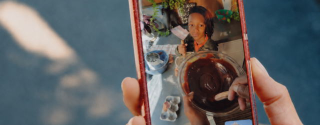 Meta smart glasses call controls shown during a WhatsApp point-of-view video call with the command “Hey Meta, camera on”.