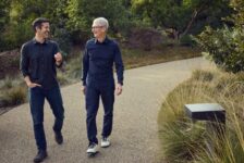 Tim Cook and John Ternus walking together at Apple Park in April 2026