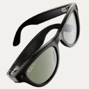 Black Ray-Ban Meta smart glasses shown at an angle, with built-in camera and tinted lenses.